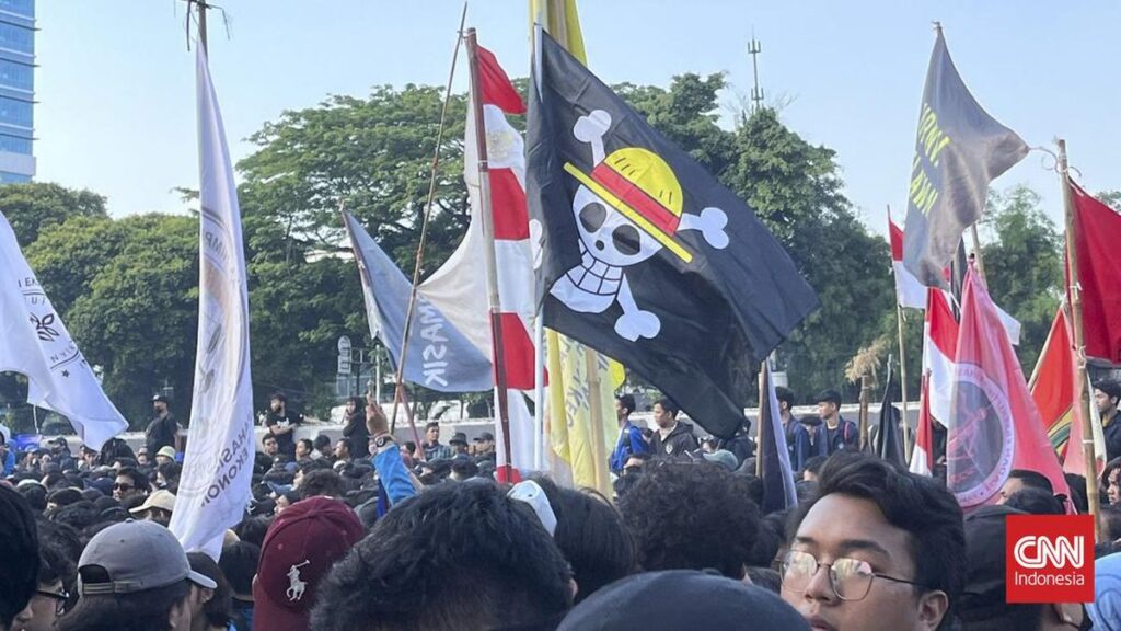 https://trenzviral.com/bendera-one-piece-ketika-tengkorak-bajak-laut-menggema-di-hati-anak-bangsa